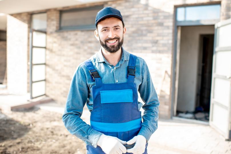 reputation-management-company for home service contractors  - builder-portrait-near-the-house